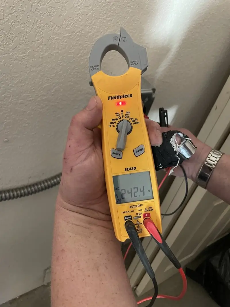 Voltage testing with clamp meter during Hot Tub / Pool Electrical Wiring in River Edge